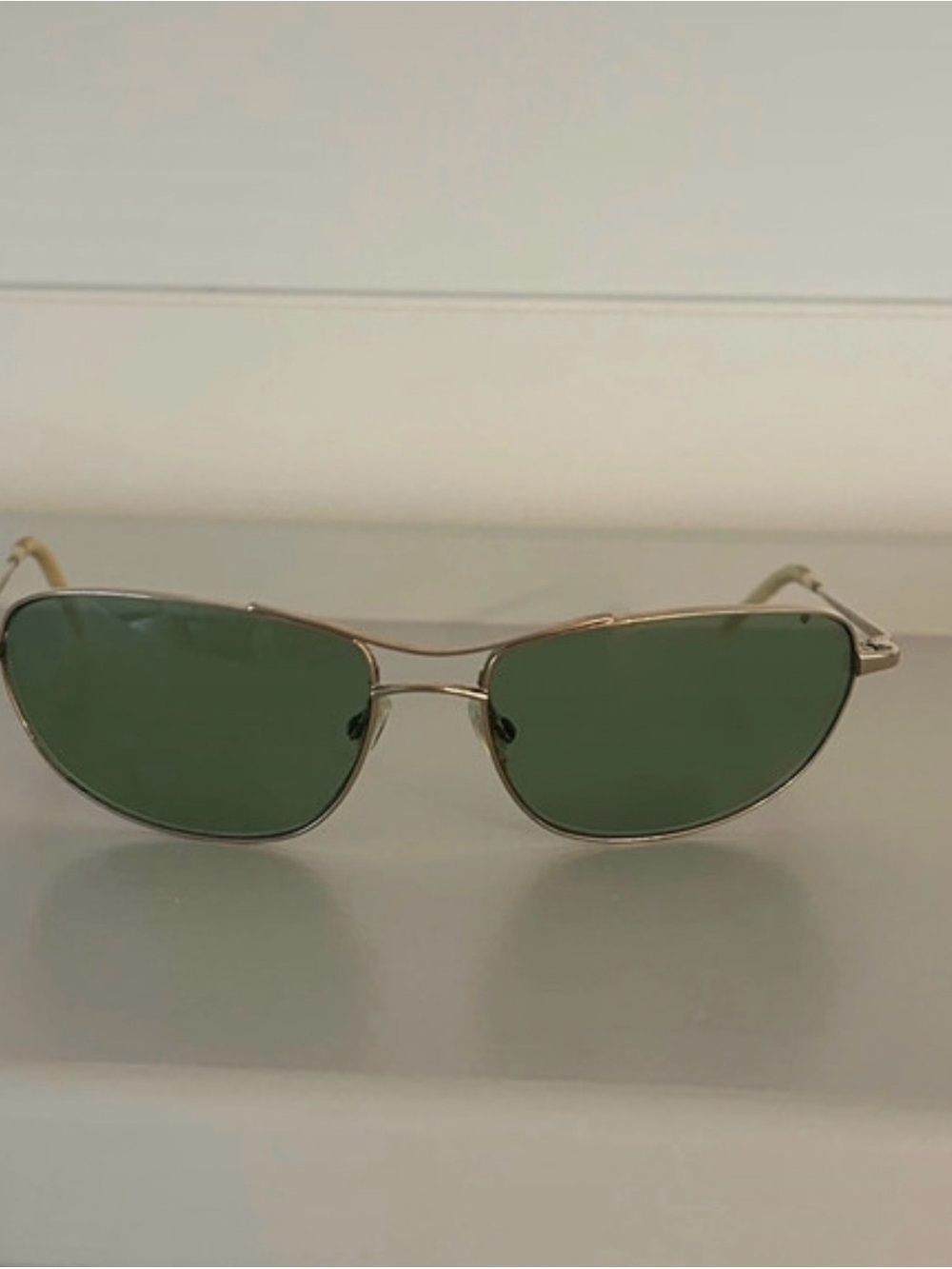 Oliver Peoples Men’s Polarized Sunglasses.